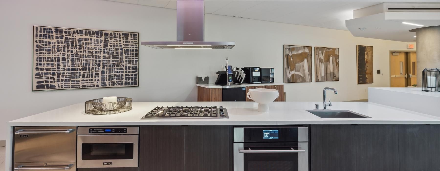 a kitchen with stainless steel appliances